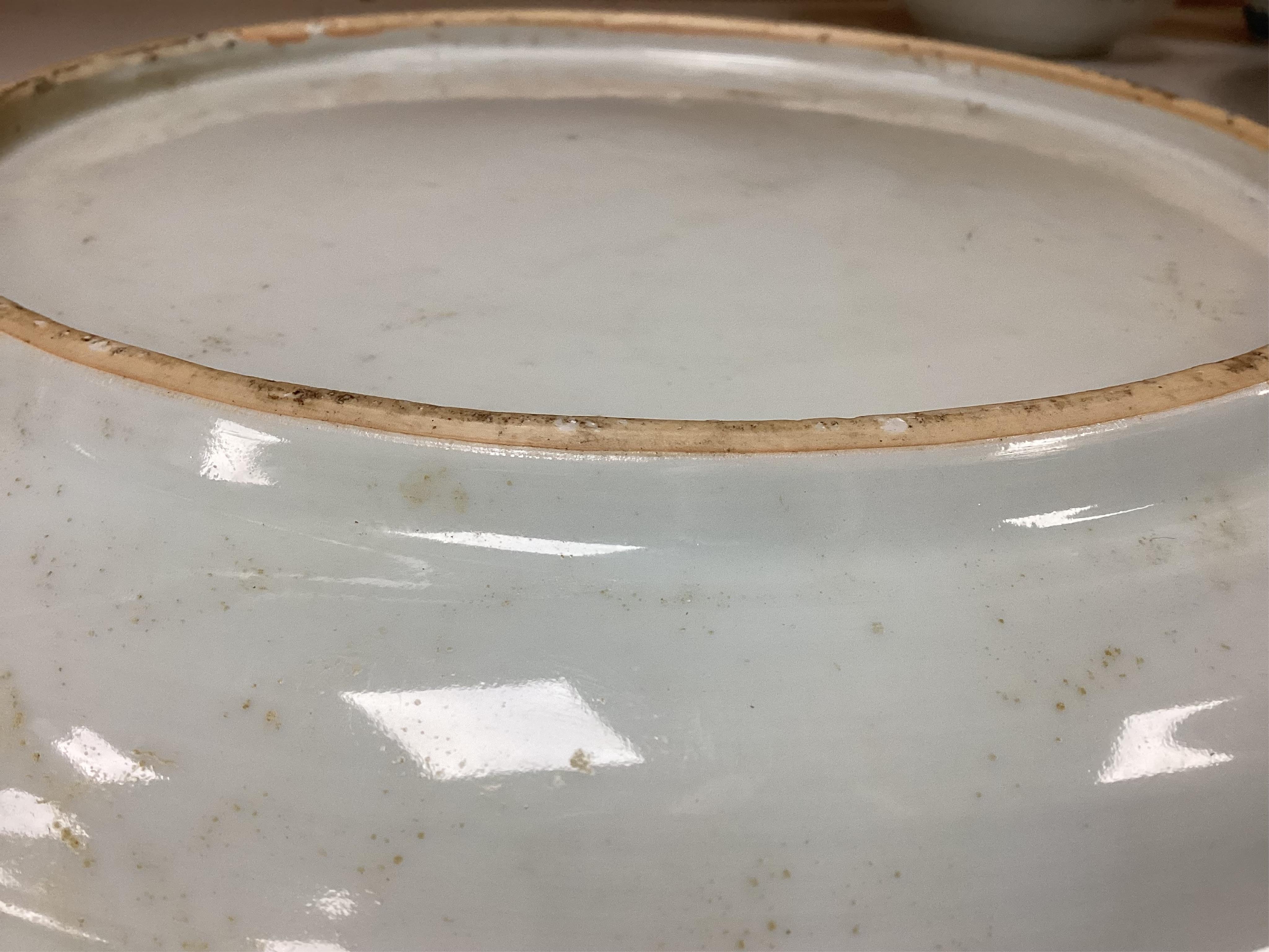 A Worcester teapot, c.1770, an 18th century Chinese famille rose and a blue and white dish, a small blue and white dish, a cup and saucer and teapot, largest dish 39cm (7). Condition - most damaged, cracked or chipped